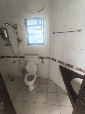 Bathroom in 1 BHK Apartment at Godrej Garden Enclave, Vikhroli East – for Rent