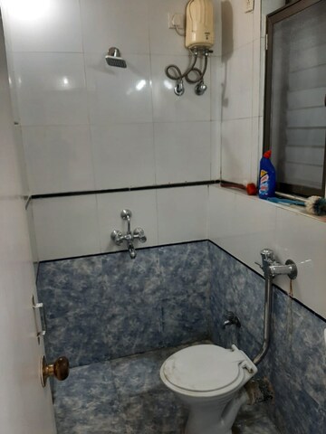 Bathroom in 2 BHK Apartment at Shrirang CHS Chunabhatti, Sion – for Rent