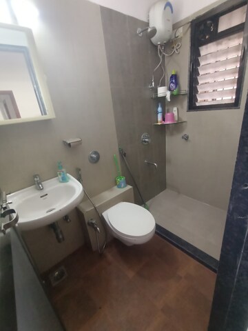 Bathroom in 2 BHK Apartment at Rosa Oasis, Ghodbunder Road – for Rent