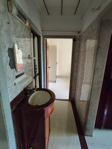 Bathroom in 1 BHK Apartment at Powai Jaltarang CHS, Powai – for Rent