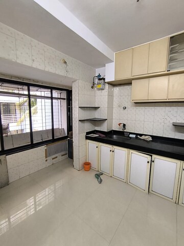 Kitchen in 1.5 BHK Apartment at Neptune CHS Andheri West, Andheri West – for Sale