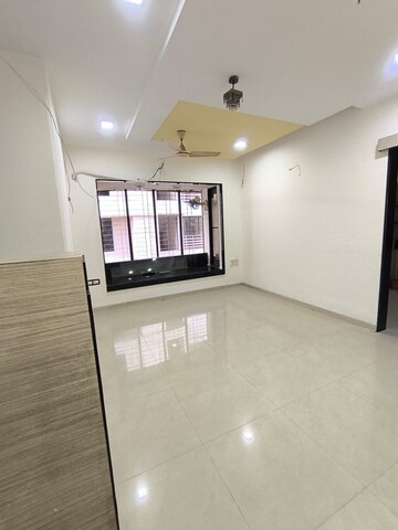 Room in 1.5 BHK Apartment at Neptune CHS Andheri West, Andheri West – for Sale