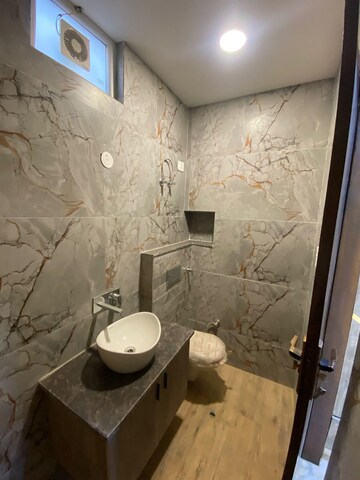 Bathroom in 3 BHK Builder Floor at Mansarover Garden – for Rent