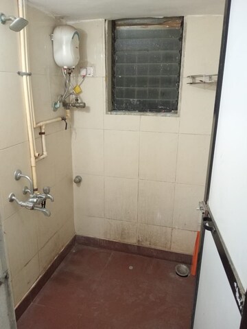 Bathroom in 1 BHK Apartment at Rebelo CHS, Andheri East – for Rent