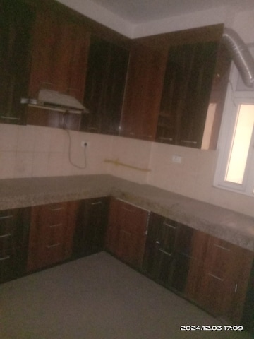 Kitchen in 2 BHK Apartment at JKG Palm Court, Sector 16c Greater Noida – for Rent