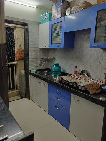 Kitchen in 1 BHK Apartment at Heena Presidency, Mira Road – for Sale