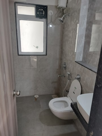 Bathroom in 2 BHK Apartment at Ashar Axis, Majiwada – for Sale