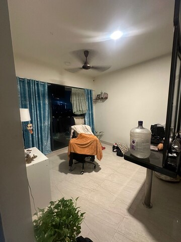 Living Room in 1 BHK Apartment at Lodha Quality Home Tower 5, Majiwada – for Rent