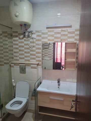 Bathroom in 4 BHK Builder Floor at Sarvodya Enclave – for Sale