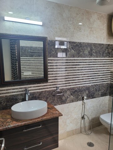 Bathroom in 4 BHK Builder Floor at Sarvodya Enclave – for Sale