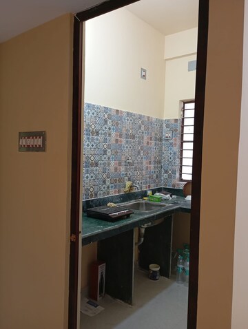 Kitchen in 3 BHK Builder Floor at Behala Chowrasta – for Sale