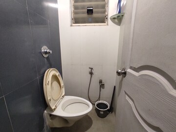 Bathroom in 1 BHK Apartment at Cosmos Lounge, Manpada – for Rent