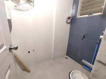 Bathroom in 1 BHK Apartment at Cosmos Lounge, Manpada – for Rent