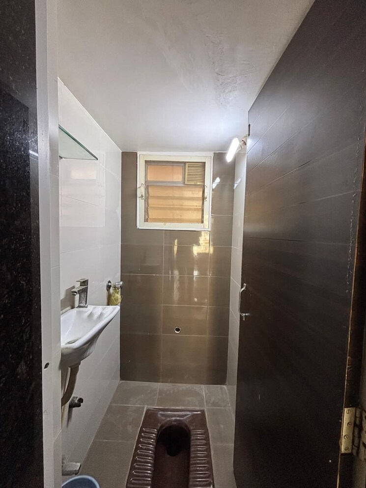 Bathroom, unique-poonam-vihar 2 Bedroom 805 Sq.Ft. Apartment In Mira Road Thane 7951307