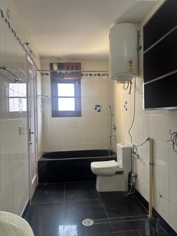 Bathroom in 4 BHK Builder Floor at Chanakyapuri – for Rent