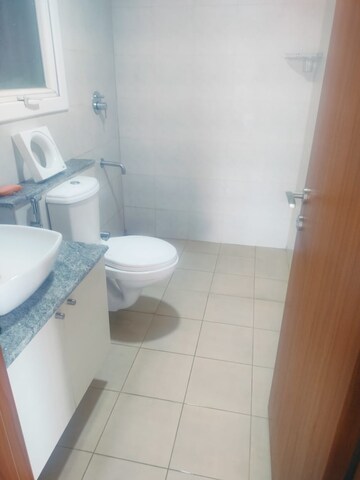Bathroom in 3 BHK Apartment at Bhartiya Nikoo Homes Phase 2, Thanisandra Main Road – for Rent
