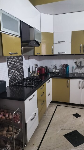 Kitchen in 3.5 BHK Apartment at Mahagun Maestro, Sector 50 – for Sale