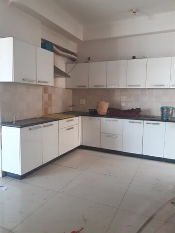 Kitchen in 3 BHK Apartment at Mahagun Mywoods, Sector 16c Greater Noida – for Rent