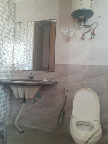 Bathroom in 3 BHK Apartment at Mahagun Mywoods, Sector 16c Greater Noida – for Rent