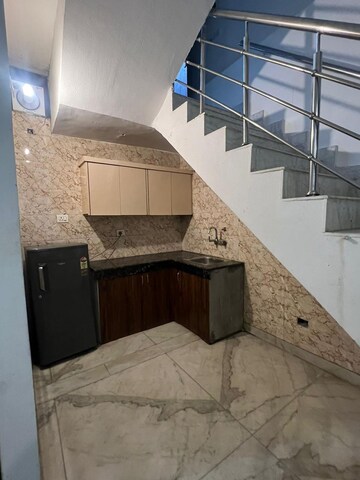Master Bedroom in 1 RK Builder Floor at Ansal Sushant Lok I, Sector 43 – for Rent