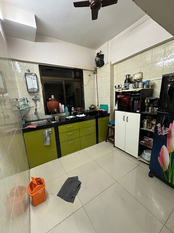 Kitchen in 2 BHK Apartment at Ajmera Girnar, Wadala – for Rent