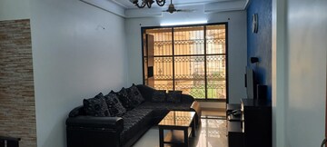 Living Room in 2 BHK Apartment at Ravechi Heights, Kharghar – for Sale