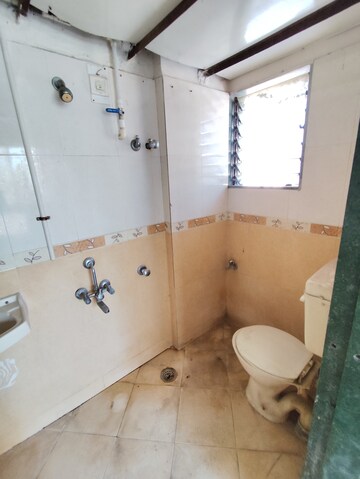 Bathroom in 2 BHK Apartment at Yashraj Park CHS, Kasarvadavali – for Sale