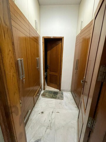Bedroom in 3 BHK Builder Floor at Ansal Sushant Lok I, Sector 43 – for Rent