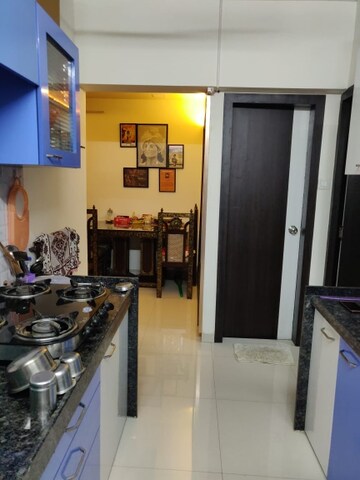 Kitchen in 2 BHK Apartment at Heena Presidency, Mira Road – for Sale