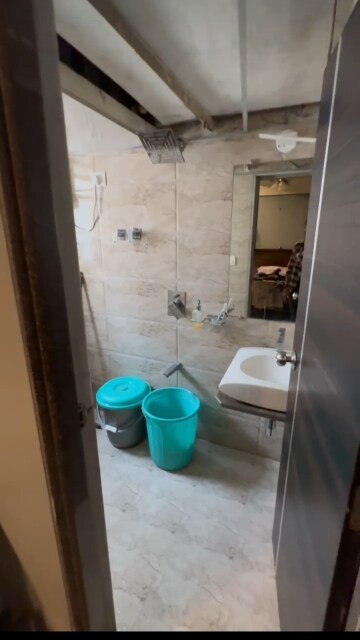 Bathroom in 2 BHK Apartment at SKD Pinnacolo, Mira Road – for Rent
