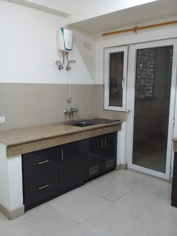 Kitchen in 4 BHK Apartment at Emaar The Enclave, Sector 66 – for Rent