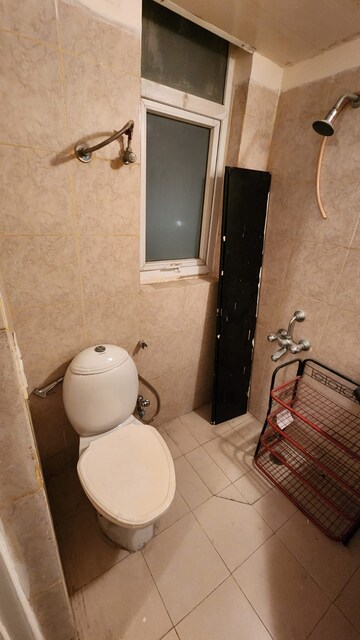 Bathroom in 3.5 BHK Apartment at Orchid Petals, Sector 49 – for Rent