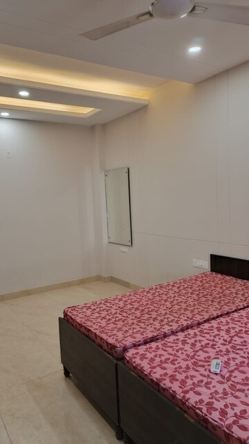 Bedroom in 3 BHK Builder Floor at Ansal Sushant Lok I, Sector 43 – for Rent