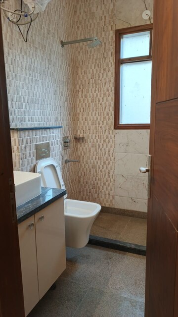 Bathroom in 3 BHK Builder Floor at Ansal Sushant Lok I, Sector 43 – for Rent