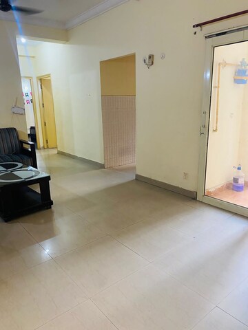 Living Room in 2 BHK Apartment at Antriksh Golf View, Sector 78 – for Rent