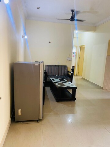 Living Room in 2 BHK Apartment at Antriksh Golf View, Sector 78 – for Rent