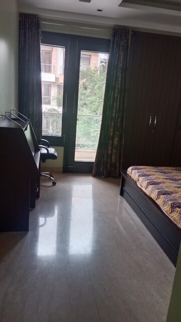 Bedroom in 4 BHK Builder Floor at Safdarjung Development Area – for Rent