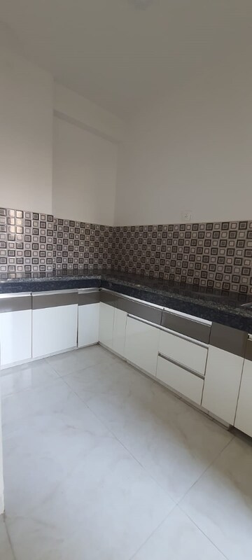 Kitchen in 2 BHK Apartment at SCC Blossom, Raj Nagar Extension – for Sale