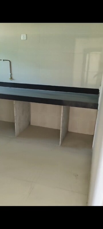 Kitchen in 2 BHK Apartment at Cosmos Habitat, Majiwada – for Sale