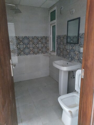 Bathroom in 3 BHK Apartment at Uninav Bliss, Raj Nagar Extension – for Sale