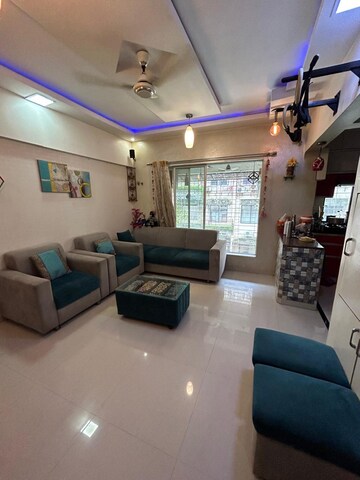 Living Room in 1 BHK Apartment at Royal Palms, Goregaon East – for Sale