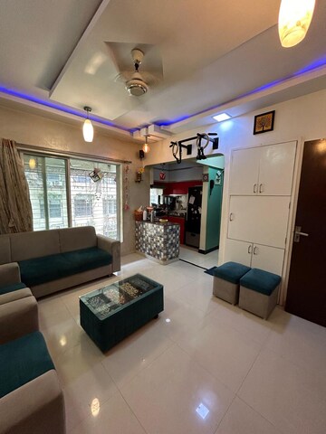 Living Room in 1 BHK Apartment at Royal Palms, Goregaon East – for Sale