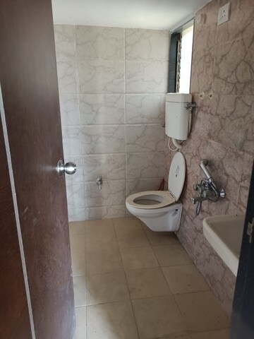 Bathroom in 2 BHK Apartment at Bhoomi Acropolis, Virar West – for Rent
