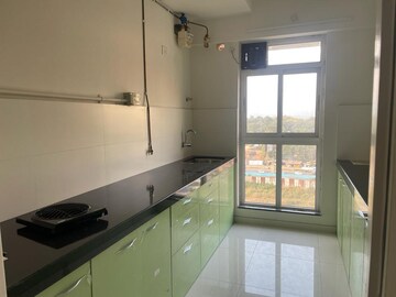 Kitchen in 1 BHK Apartment at Puranik City Reserva, Ghodbunder – for Rent