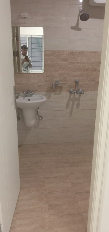 Bathroom in 3 BHK Apartment at Unishire Indira Elan, Rachenahalli – for Rent