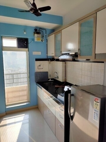Kitchen in 1 BHK Apartment at KIPL Morya, Kasarvadavali – for Rent