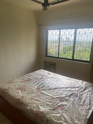 Bedroom in 1 BHK Apartment at KIPL Morya, Kasarvadavali – for Rent