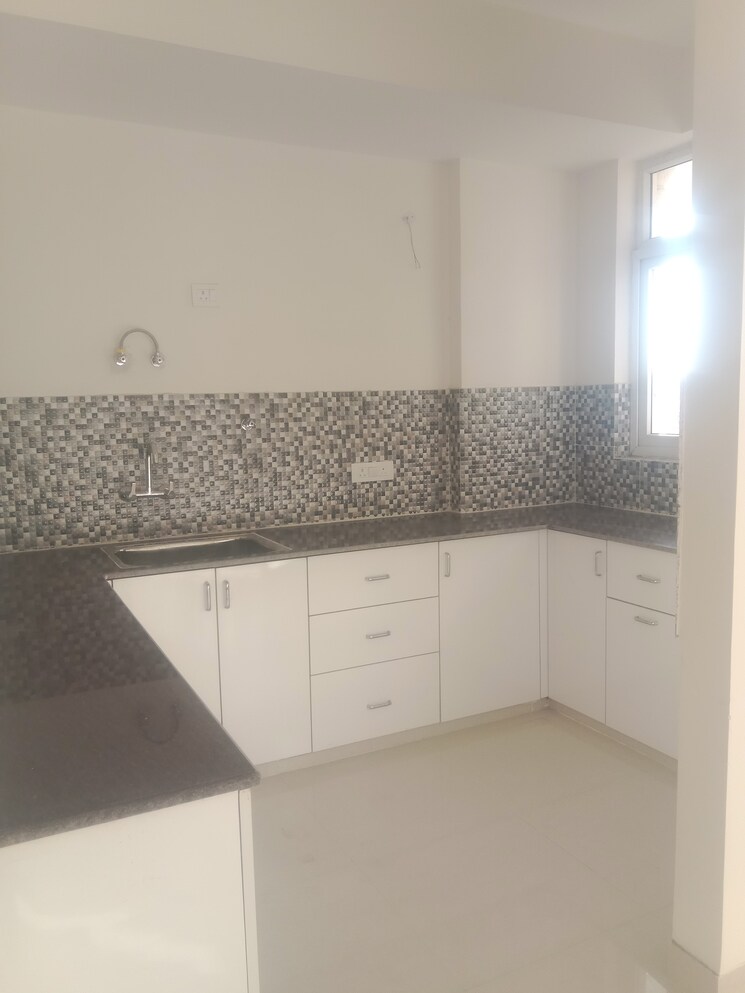 Kitchen, shapoorji-pallonji-joyville-gurgaon 4 Bedroom 2162 Sq.Ft. Apartment In Sector 102 Gurgaon 7953571