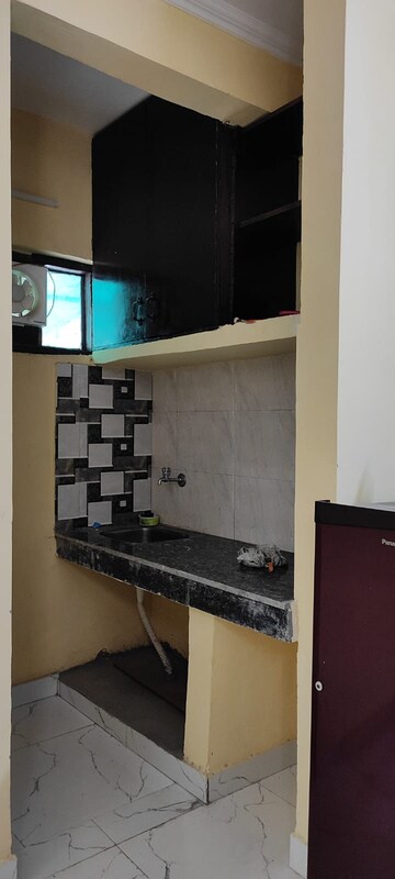 Kitchen in 1 RK Builder Floor at Ansal Sushant Lok I, Sector 43 – for Rent