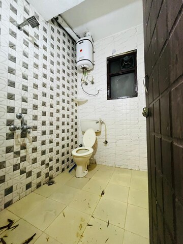 Bathroom in 1 BHK Builder Floor at Ansal Sushant Lok I, Sector 43 – for Rent